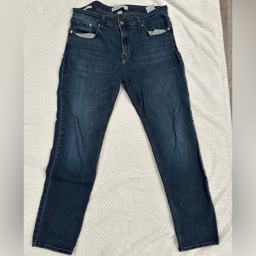 Never worn Calvin Klein blue jeans